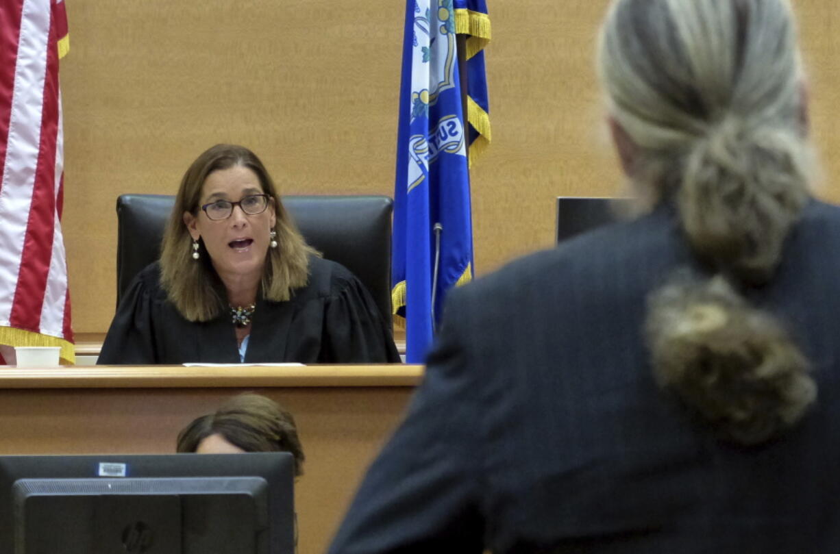 Alex Jones' attorney Norm Pattis, right, is warned by Judge Barbara Bellis to not speak over her during Jones' Sandy Hook defamation damages trial at Connecticut Superior Court in Waterbury, Conn., Friday, Sept. 23, 2022.