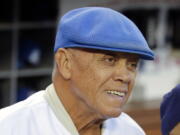Former Los Angeles Dodgers shortstop Maury Wills in 2014. Wills, who helped the Los Angeles Dodgers win three World Series titles with his base-stealing prowess, has died. The team says Wills died Monday night, Sept. 19, 2022, in Sedona, Ariz. He was 89. (AP Photo/Jae C.