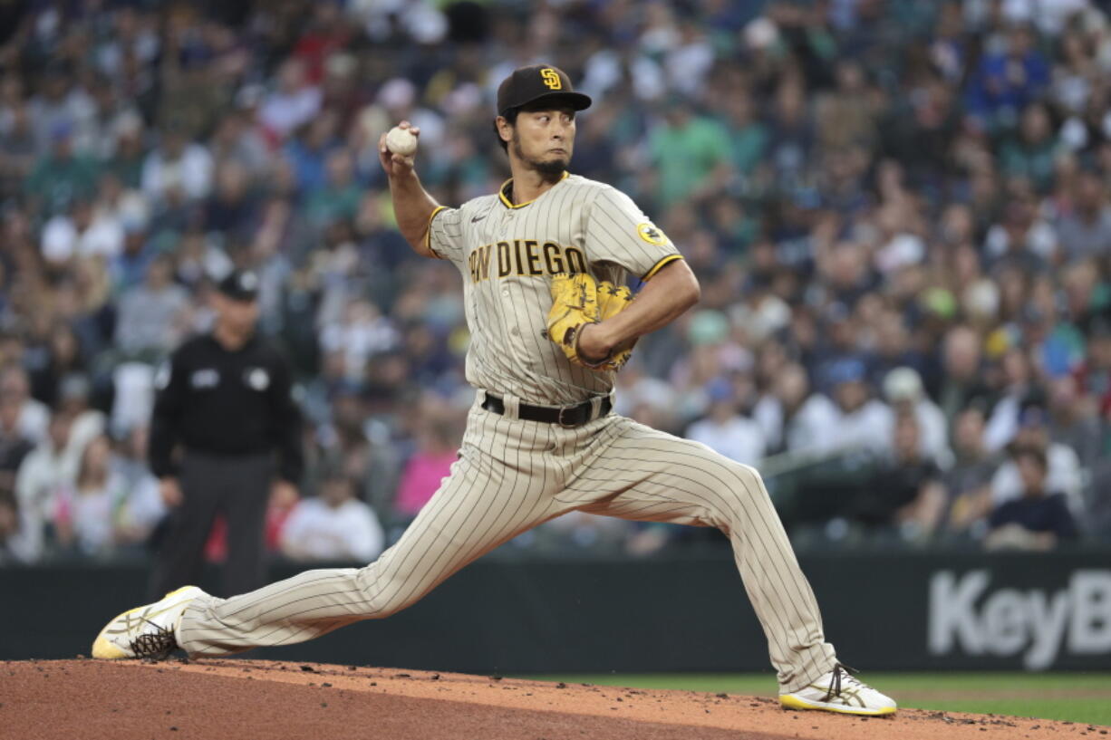 San Diego Padres starting pitcher Yu Darvish throws to a Seattle Mariners batter during the first inning of a baseball game Tuesday, Sept. 13, 2022, in Seattle.