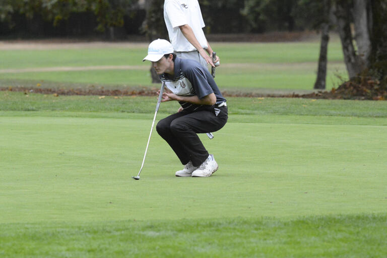 Union's Laredo Maldonado sizes up a putt on the No. 13 hole at Glendoveer Golf Course in Portland during the Prairie Invitational on Wednesday, Sept. 28, 2022.