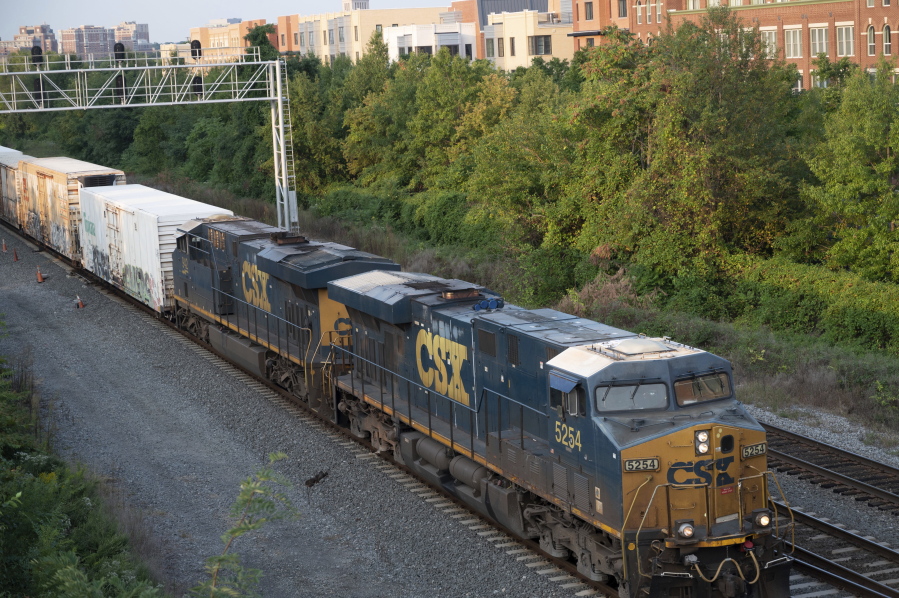 A CSX freight train travels through Alexandria, Va. on Thursday, Sept. 15, 2022.