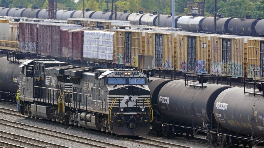 FILE - Norfolk Southern locomotives work in the in the Conway Terminal on Sept. 15, 2022, in Conway, Pa. The railroad union that rejected its deal with the nation's freight railroads earlier this month even though it offered 24% raises now has a new tentative agreement, but officials cautioned that the contract dispute won't be fully settled until all 12 rail unions approve their agreements this fall. (AP Photo/Gene J.