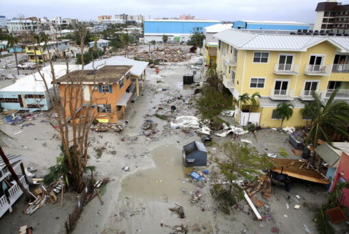 Damaged homes and businesses are seen in Fort Myers Beach, Fla., on Thursday, Sep 29, 2022, following Hurricane Ian. (Douglas R.