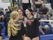 Union’s Ruby Ochoa (11) celebrates a point with her teammates during the Titans’ match at Mountain View on Thursday, Sept. 8, 2022.