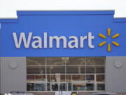 FILE - Shown is a Walmart location in Philadelphia, Wednesday, Nov. 17, 2021.  Walmart is teaming up with a fertility startup to offer benefits under its insurance plan that will help its workers expand their families. The nation's largest retailer and private employer said Tuesday, Sept. 27, 2022,  it's partnering with New York-based Kindbody to offer benefits such as in vitro fertilization as well as fertility testing regardless of sex, sexual orientation, gender identity, or marital status.