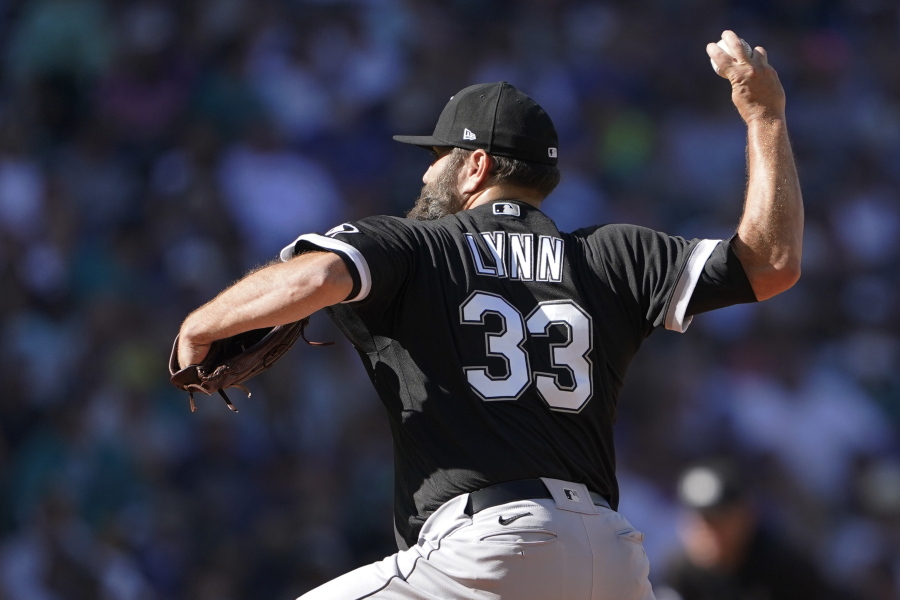 Chicago White Sox starting pitcher Lance Lynn throws against the Seattle Mariners during the first inning of a baseball game, Monday, Sept. 5, 2022, in Seattle. (AP Photo/Ted S.