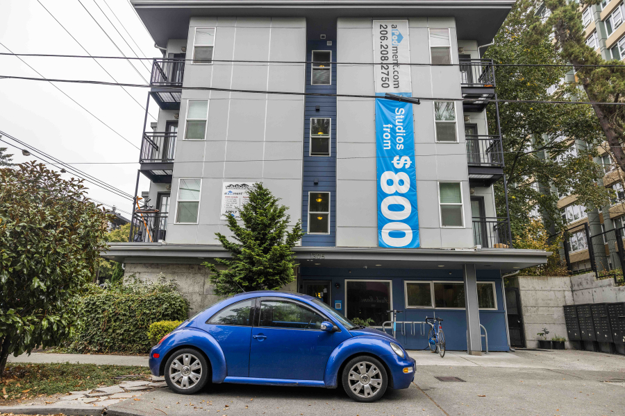 A micro-apartment building sits at the intersection of 13th Avenue East and East Mercer Street on Oct. 5. The developer of 23 micro-apartment buildings is selling all of the buildings.