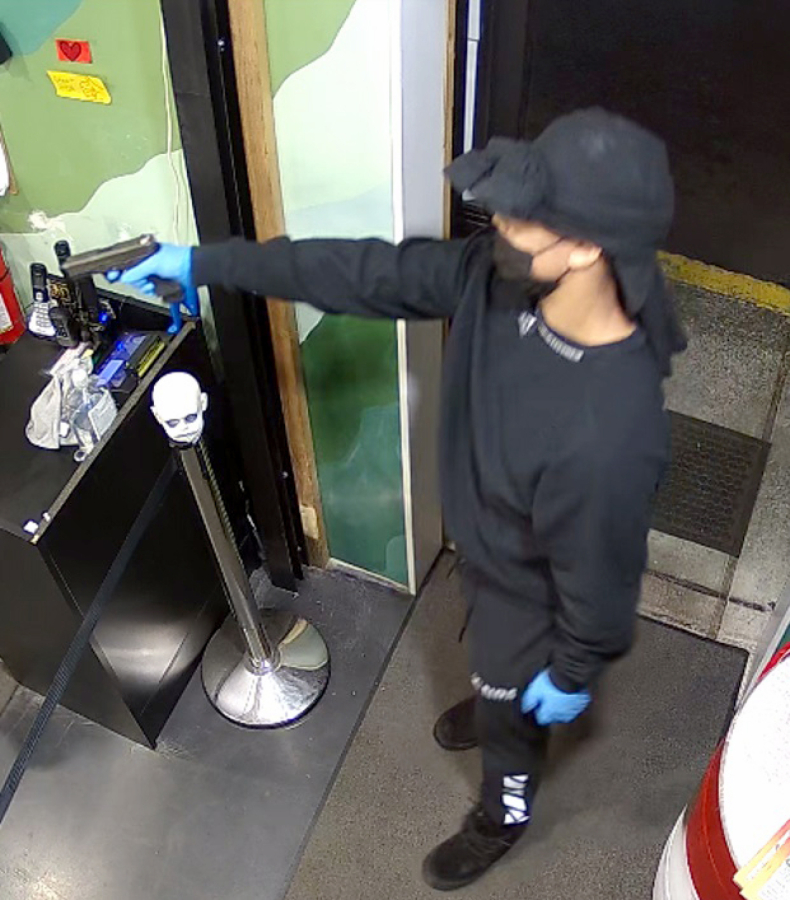 Detectives are looking for three armed robbers seen in surveillance video from Sticky's Pot Shop in Hazel Dell on Sept. 19.