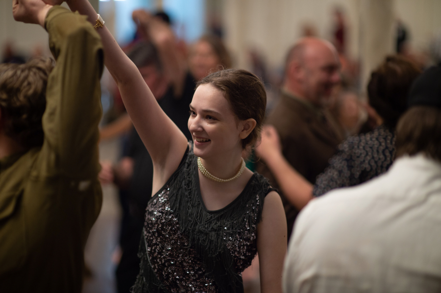 Camas High School student Audrey Wagner, 16, dances with friends to the music of the Ne Plus Ultra Jass Orchestra at Providence Academy.