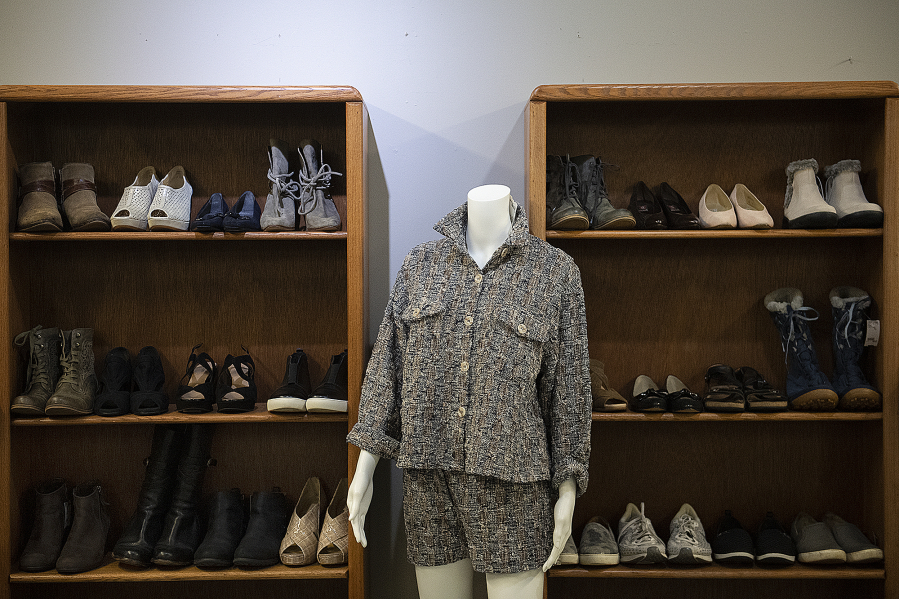 A selection of shoes and fashions on display at b.divine resale clothing boutique in downtown Vancouver. High-end designer items are priced accordingly, though bargains can be found.