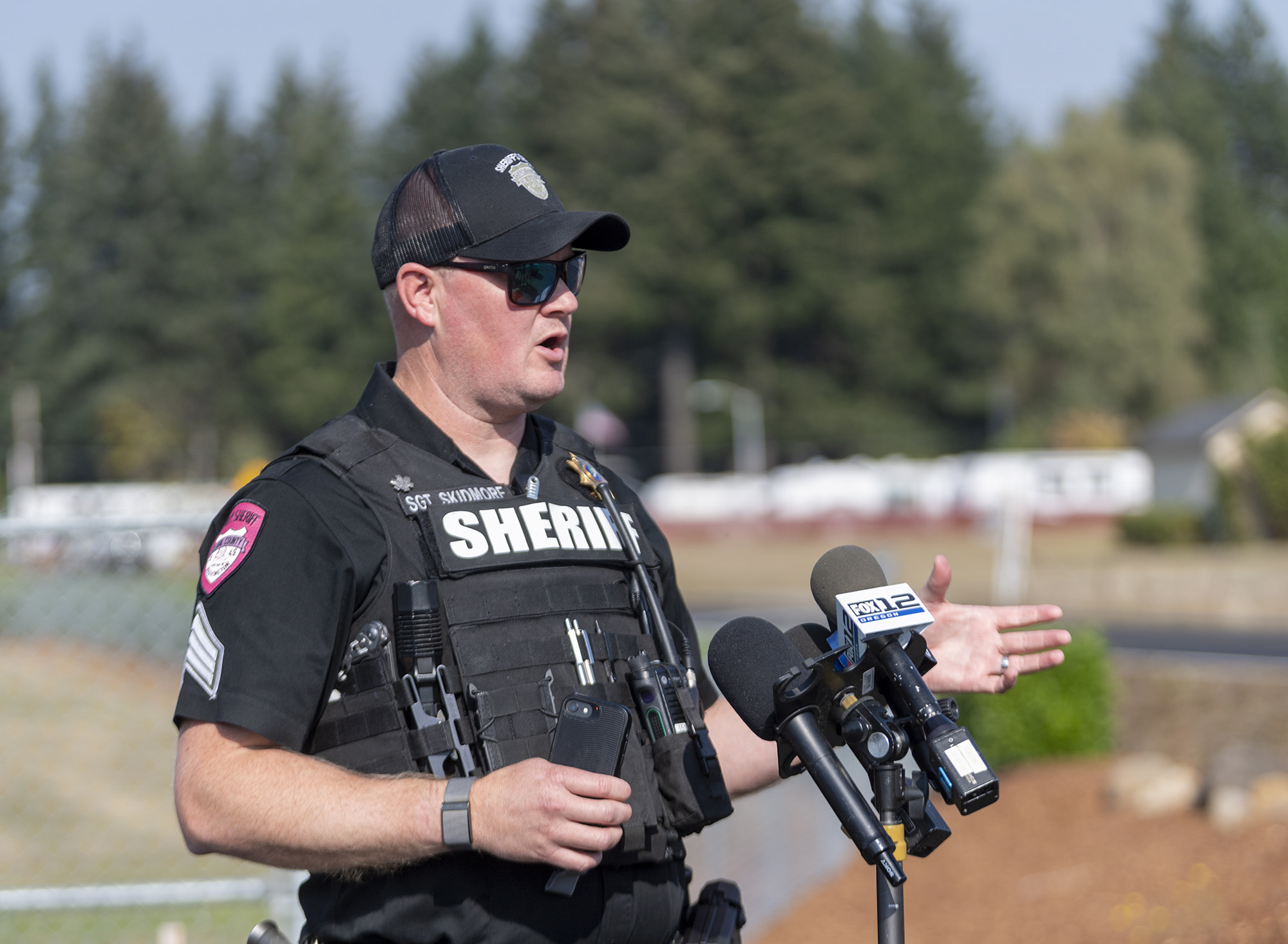 Clark County Sheriff public information officer Chris Skidmore talks to media Monday, Oct. 17, 2022, during a briefing at Grove Field in Camas. The Nakia Creek Fire ballooned to more than 1400 acres after dry and windy conditions on Sunday.