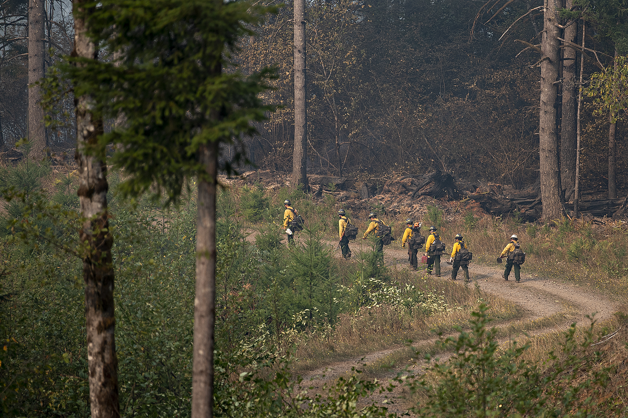 Fire crews navigate terrain while working at the Nakia Fire on Wednesday afternoon, Oct. 19, 2022.