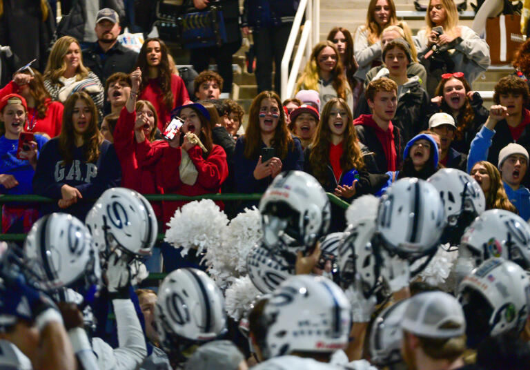 Skyview students celebrate with the team Friday, Oct. 28, 2022, after the Storm beat Union 28-6 at McKenzie Stadium.