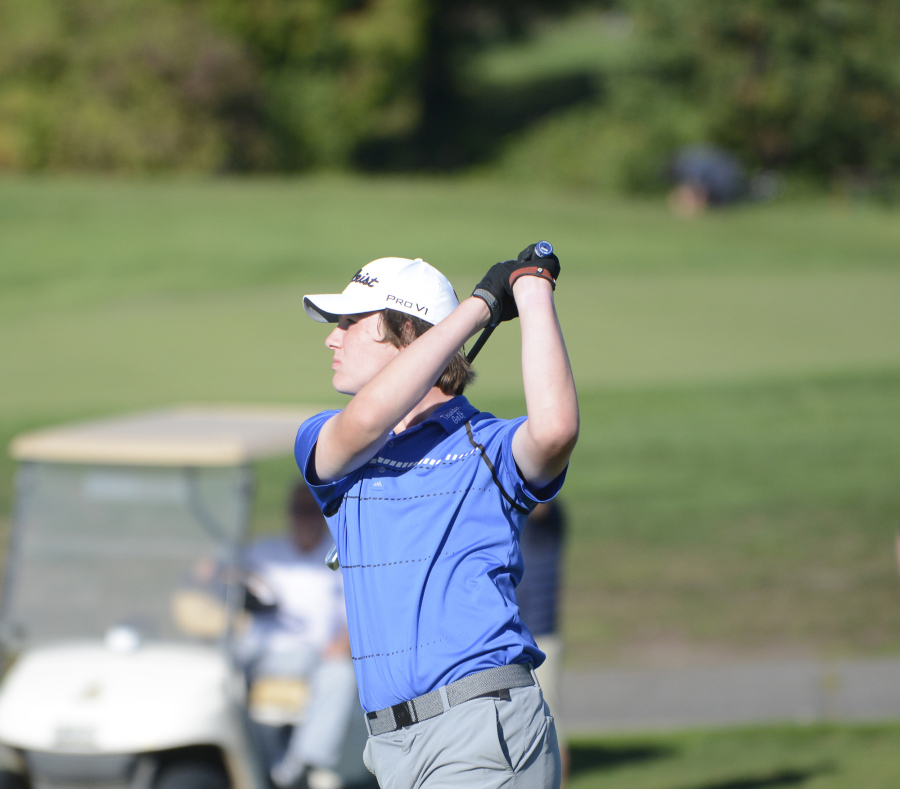 Mountain View's Grady Millar watches his drive on the No. 14 hole at Heron Lakes Golf Course in Portland during the 3A district golf tournament on Tuesday, Oct. 11, 2022.