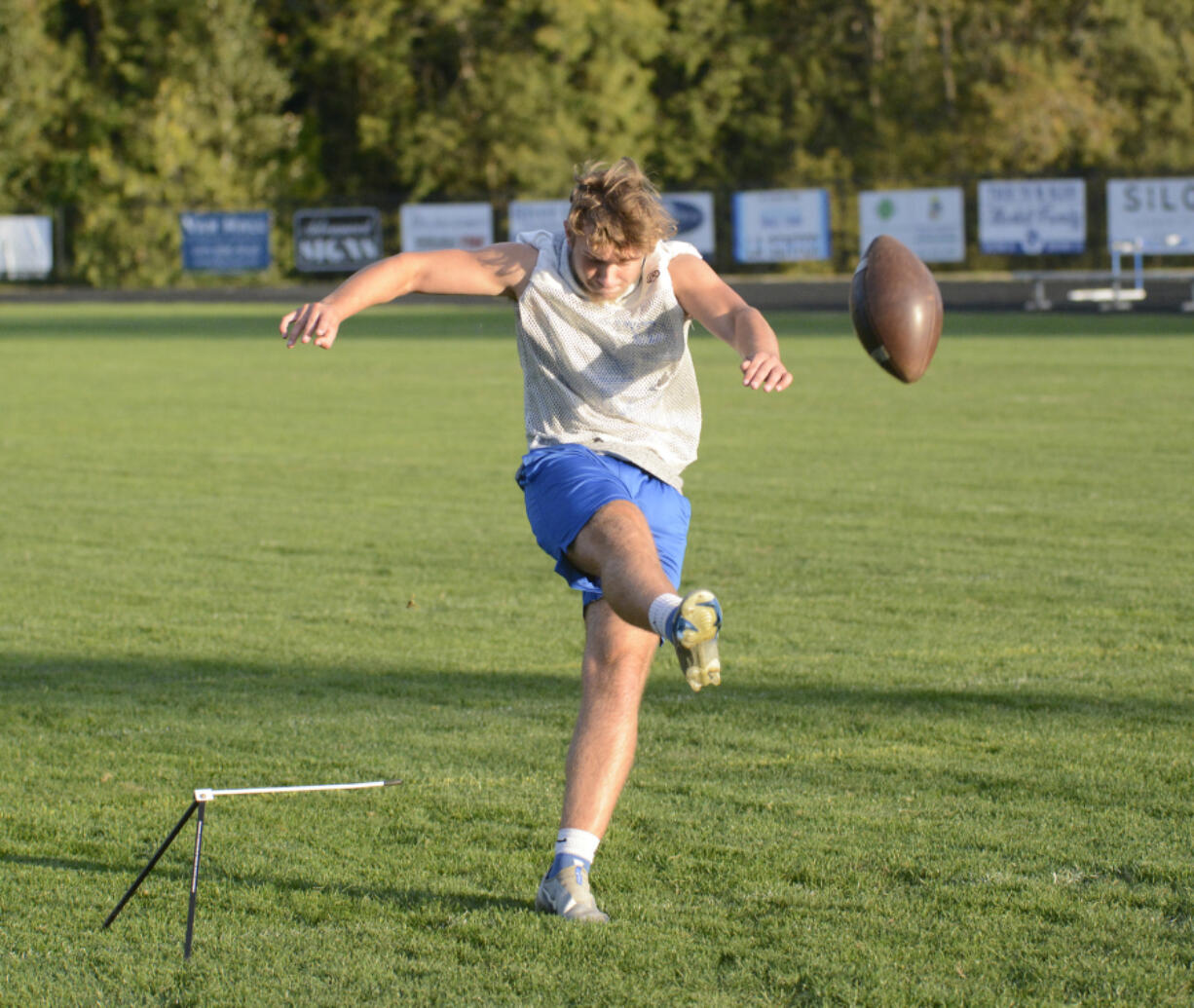 La Center kicker Ben Rembisz goes through a drill at practice at La Center High School on Monday. Rembisz kicked the game-winning field goal on Saturday as the Wildcats won at Mount Baker 25-24.
