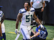 Seattle Seahawks linebacker Bruce Irvin (51) laughs after an NFL football game against the Atlanta Falcons, Sunday, Sept. 13, 2020, in Atlanta. The Seattle Seahawks won 38-25.