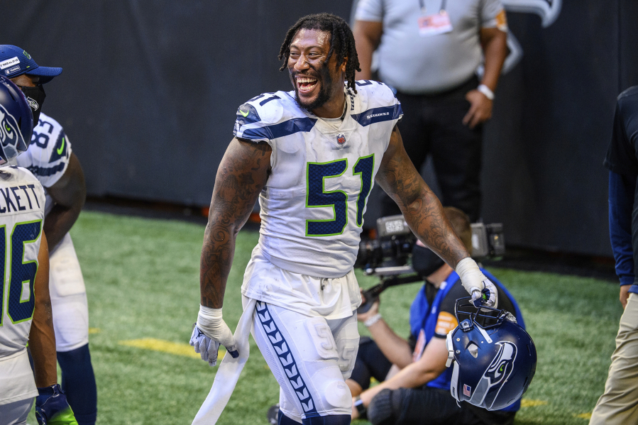 Seattle Seahawks linebacker Bruce Irvin (51) laughs after an NFL football game against the Atlanta Falcons, Sunday, Sept. 13, 2020, in Atlanta. The Seattle Seahawks won 38-25.