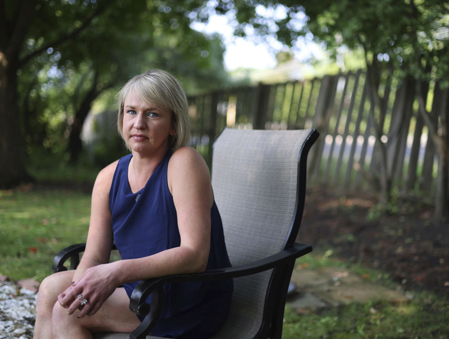 Christine Settingsgaard sits in her yard on Sept 14, 2022, in Barrington. Settingsgaard was lured into sophisticated financial scam this summer via a man she met on Hinge.