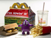McDonald's is offering a way for adults to recapture some of the joy of their youth with Adult Happy Meals. (E.