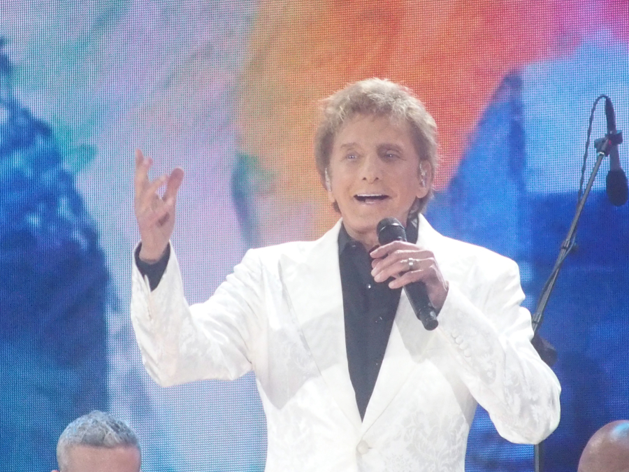 Barry Manilow performs before a hurricane prompted the premature end of the concert Aug. 22, 2021.