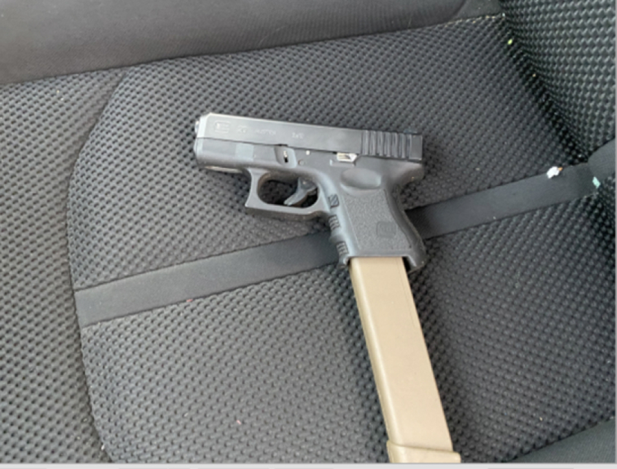 A gun with a 30-round extended magazine recovered from a stolen vehicle after it was searched by the Clark County Sheriff's Office. Deputies arrested two men in connection with two stolen cars last week.