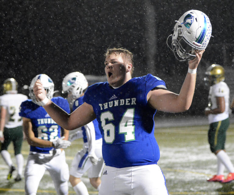 Mountain View lineman Adam Youkon celebrates after the Thunder earned a playoff berth by winning the 3A Greater St. Helens League tiebreaker at Doc Harris Stadium on Monday, Oct. 31, 2022.
