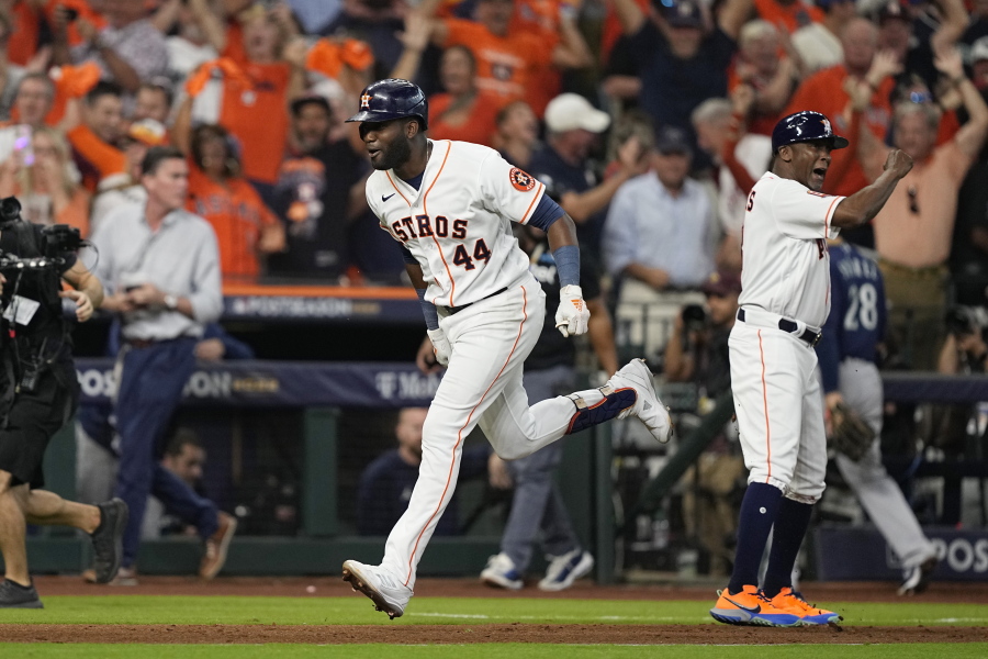 Houston Astros designated hitter Yordan Alvarez (44) celebrates with teammates after his three-run, walkoff home run against the Seattle Mariners during the ninth inning in Game 1 of an American League Division Series baseball game in Houston,Tuesday, Oct. 11, 2022. (AP Photo/David J.