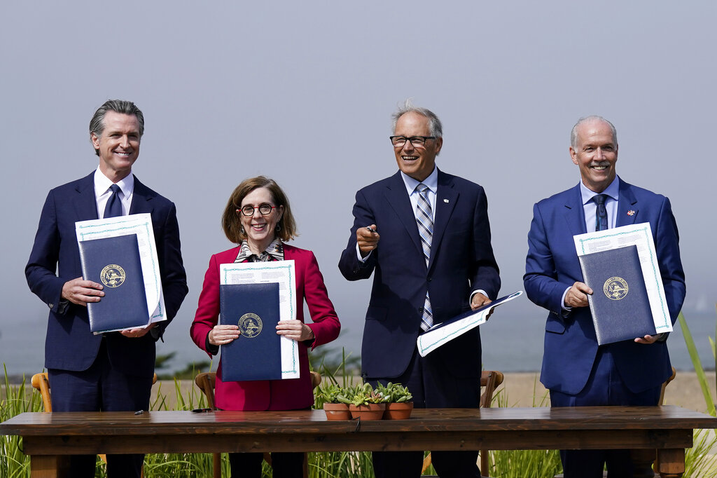 Washington, West Coast leaders renew pledge to fight climate change