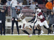 Oregon State wide receiver Tre'Shaun Harrison (0) runs after a catch for a 56-yard touchdown against Stanford during the second half of an NCAA college football game in Stanford, Calif., Saturday, Oct. 8, 2022. Oregon State won 28-27. (AP Photo/Godofredo A.