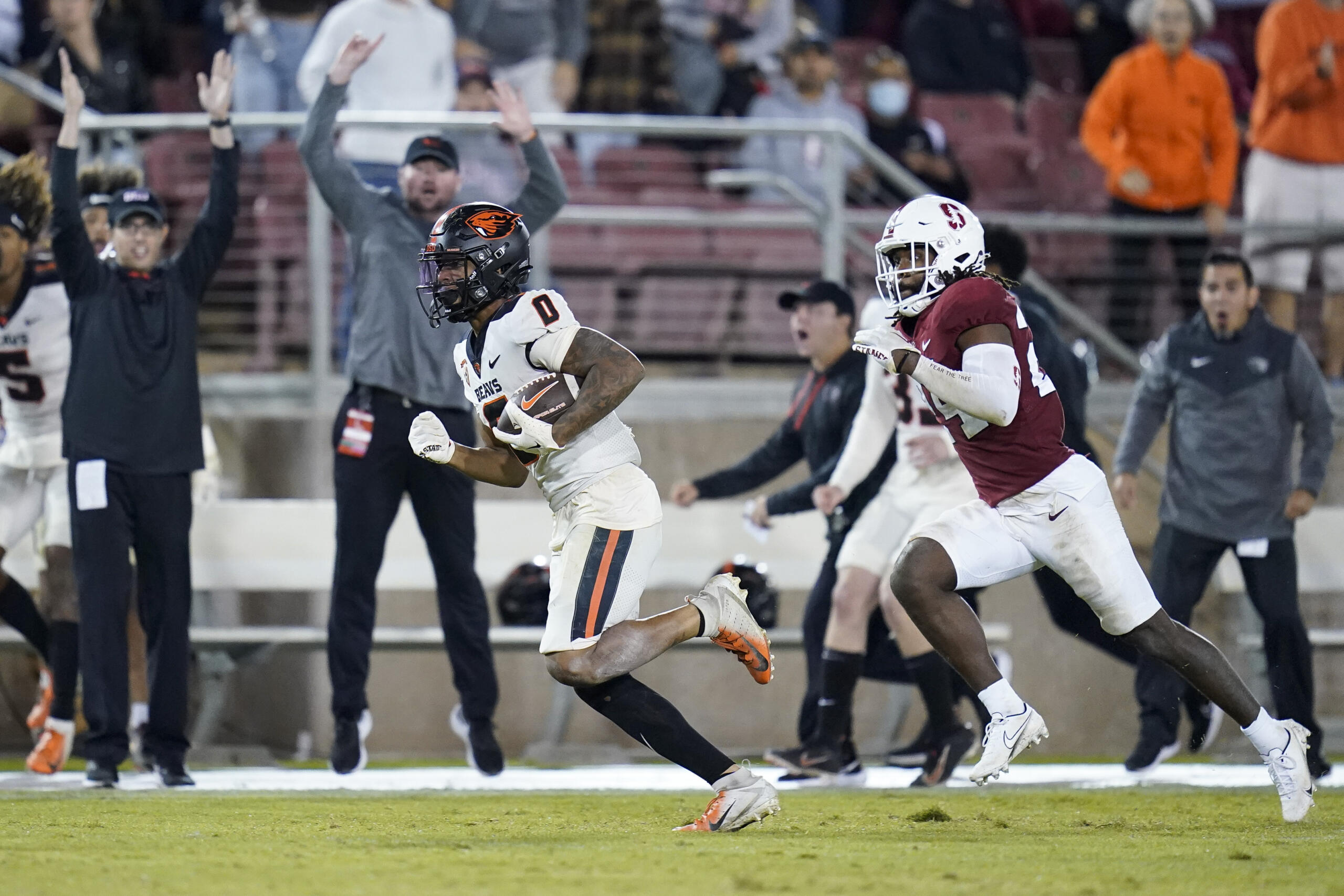 Oregon State wide receiver Tre'Shaun Harrison (0) runs after a catch for a 56-yard touchdown against Stanford during the second half of an NCAA college football game in Stanford, Calif., Saturday, Oct. 8, 2022. Oregon State won 28-27. (AP Photo/Godofredo A.