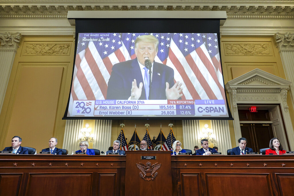 A video of then-President Donald Trump speaking is displayed as the House select committee investigating the Jan. 6 attack on the U.S. Capitol holds a hearing on Capitol Hill in Washington, Thursday, Oct. 13, 2022.