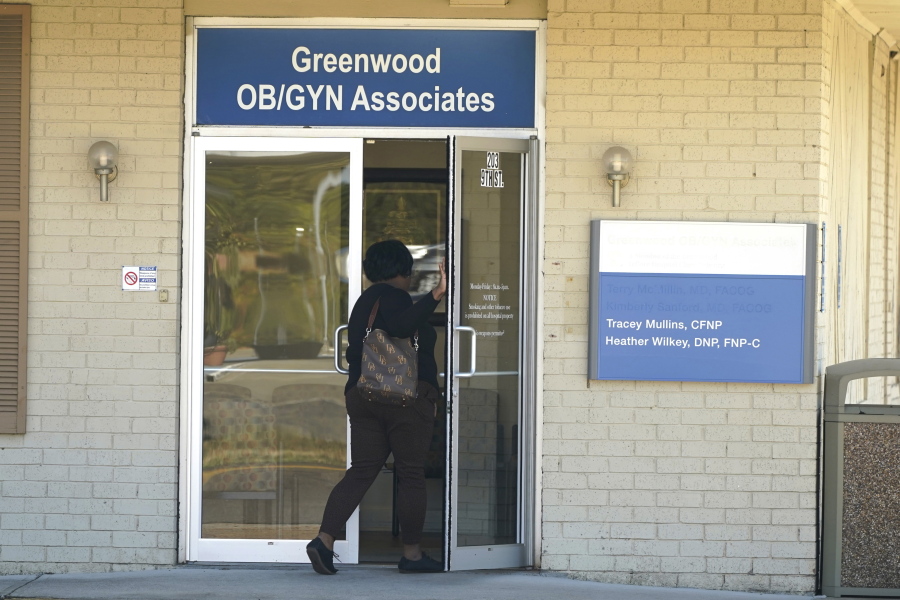 An individual enters the Greenwood OB/GYN Associates clinic across the street from the Greenwood Leflore Hospital in Greenwood, Miss., Oct. 21, 2022. (AP Photo/Rogelio V.