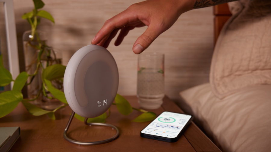 This image provided by Amazon shows the Halo Rise bedside smart alarm. The e-commerce and tech giant said Wednesday, Sept. 28, 2022, that it will start selling the device later this year. Halo Rise will be able to track sleeping patterns without a wristband by using no-contact sensors and artificial intelligence to measure a user'??s movement and breathing patterns, according to Amazon.