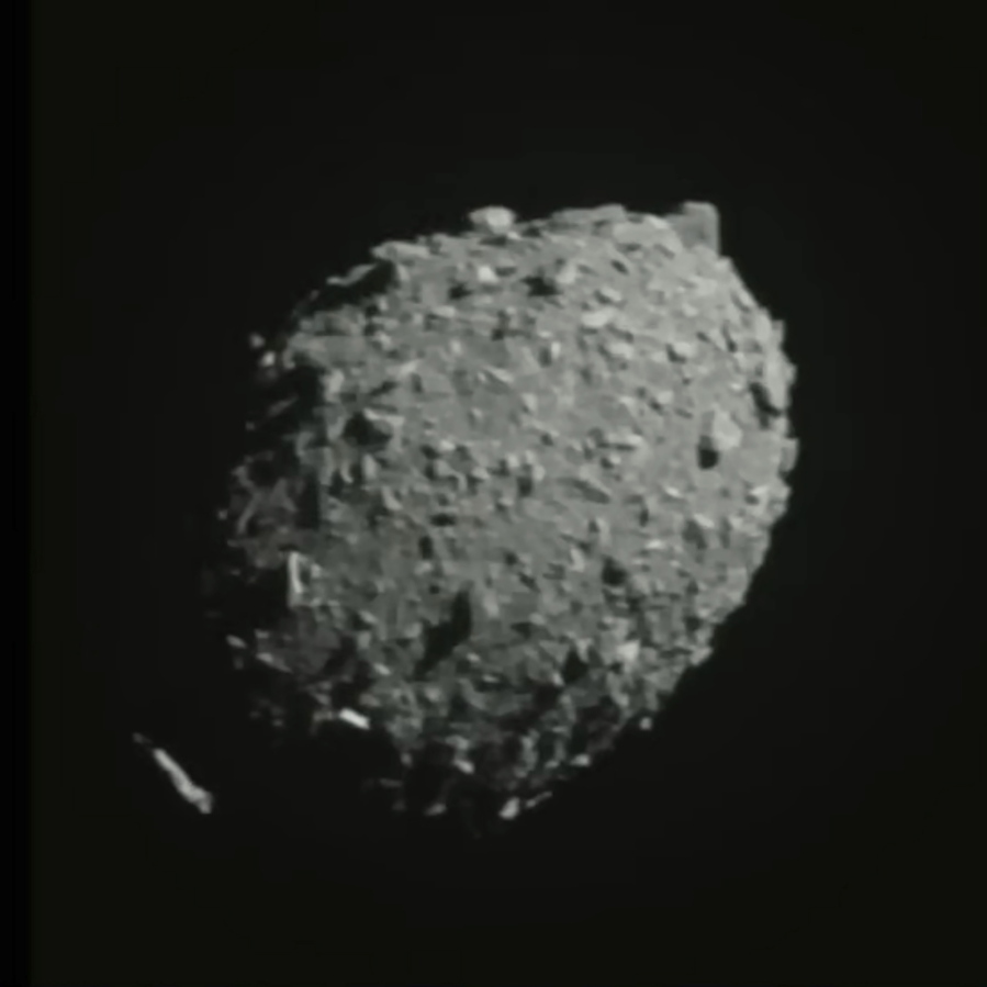 In this image made from a NASA livestream and taken from the Double Asteroid Redirection Test spacecraft, asteroid Dimorphos is seen as the spacecraft flies toward it, Monday, Sept. 26, 2022.