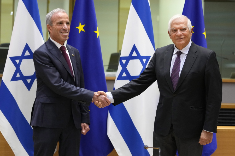 European Union foreign policy chief Josep Borrell, right, greets Israel's Minister of Intelligence Elazar Stern prior to a meeting of the EU-Israel Association Council at the EU Council building in Brussels on Monday, Oct. 3, 2022.