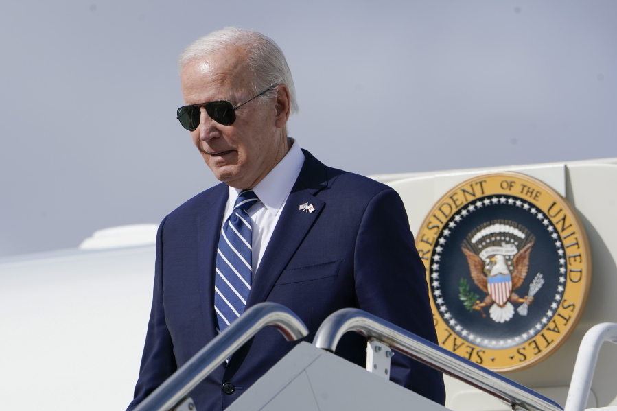 President Joe Biden exits Air Force One as he arrives at Hancock Field Air National Guard Base in Mattydale, N.Y., Thursday, Oct. 27, 2022. Biden traveling to visit the Micron chip facility in Syracuse, N.Y.
