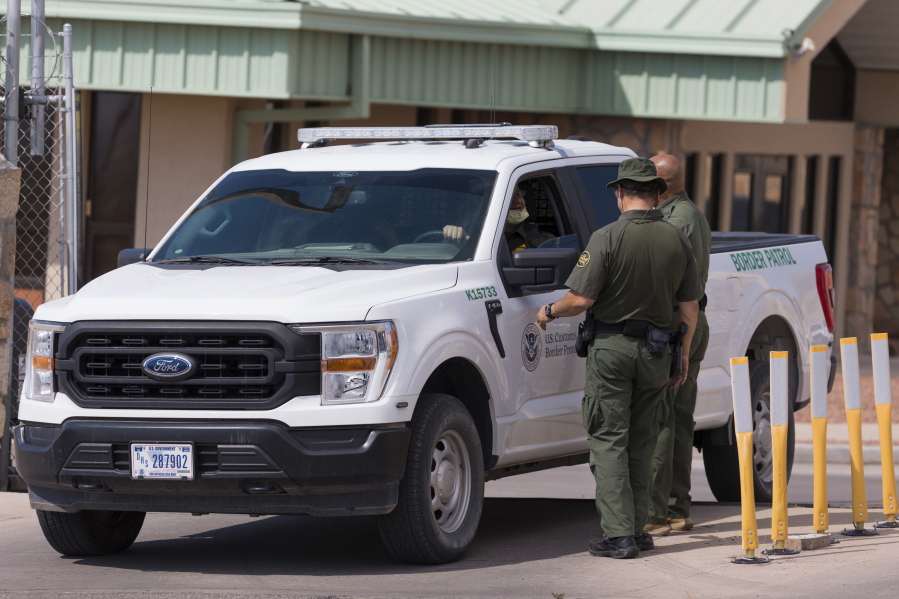 Border Patrol agents stand near the site where a Mexican detainee was fatally shot at the Ysleta Border Patrol Station, Tuesday, Oct. 4, 2022, in El Paso, Texas. According to officials, the man later died at an El Paso hospital. The Mexican Consulate in El Paso said in a statement that the man was a Mexican citizen who was being processed on criminal charges.