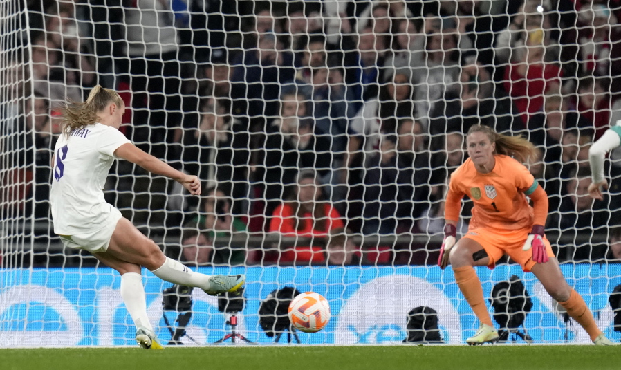 England's Georgia Stanway shoots to score from the penalty spot during the women's friendly soccer match between England and the US at Wembley stadium in London, Friday, Oct. 7, 2022.