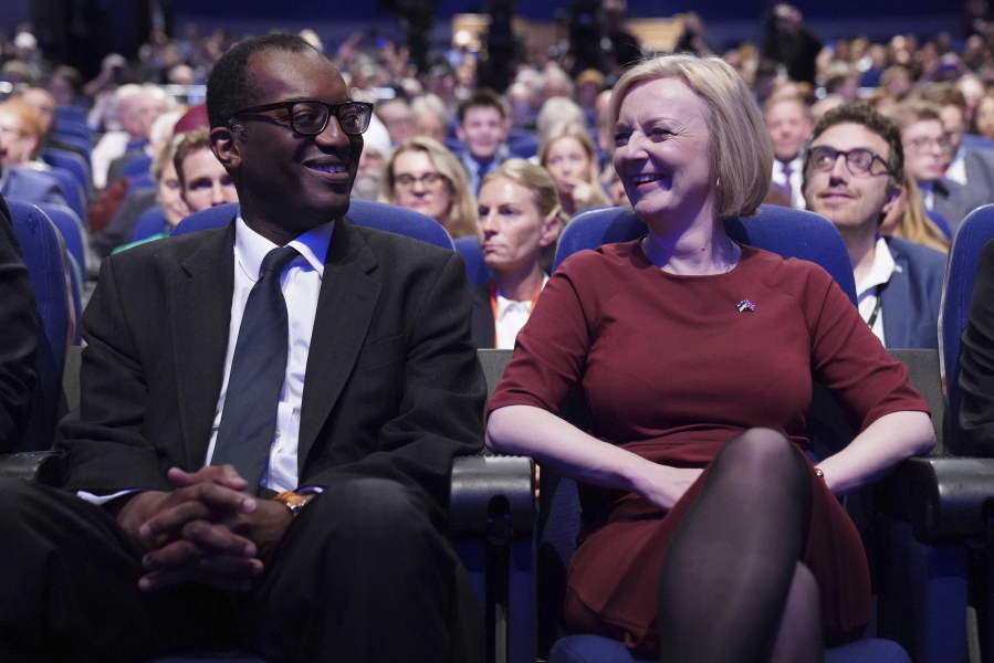British Chancellor of the Exchequer Kwasi Kwarteng, left, and British Prime Minister Liz Truss at the Conservative Party annual conference at the International Convention Centre in Birmingham, England, Sunday Oct. 2, 2022.