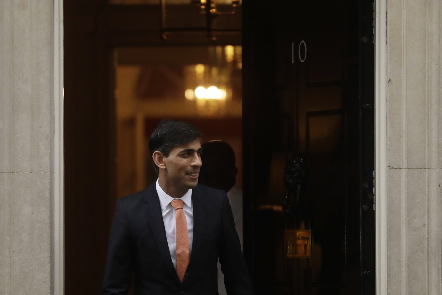 FILE -British newly appointed Chancellor of the Exchequer Rishi Sunak leaves 10 Downing Street, where he was given the job by Britain's Prime Minister Boris Johnson, in London, Thursday, Feb. 13, 2020. Sunak ran for Britain's top job and lost. Now he's back with a second chance to become prime minister.