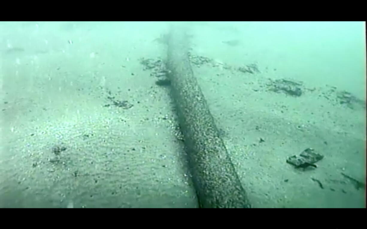 FILE - This still image from video taken Oct. 4, 2021, and provided by the U.S. Coast Guard shows an underwater pipeline that spilled tens of thousands of gallons of oil off the coast of Orange County, Calif. The U.S. Army Corps of Engineers granted the approval Friday, Sept. 30, 2022, to Amplify Energy Corp. to repair the pipeline. The Houston company pleaded guilty to federal charges last month of negligently discharging oil. (U.S.