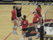 Members of the Camas volleyball team celebrate a point during the Papermakers' win over Skyview at Camas High School on Thursday, Oct. 27, 2022.