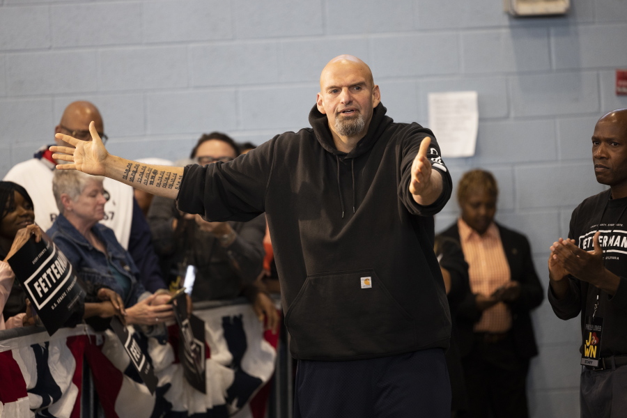 FILE--Pennsylvania Lt. Gov. John Fetterman, a Democratic candidate for U.S. Senate, meets with supporters as he leaves his event in Philadelphia, in this file photo from Sept. 24, 2022. Black voters are at the center of an increasingly competitive battle in a race that could tilt control of the Senate between Fetterman and Republican Mehmet Oz, as Democrats try to harness outrage over the Supreme Court's abortion decision and Republicans tap the national playbook to focus on rising crime in cities.