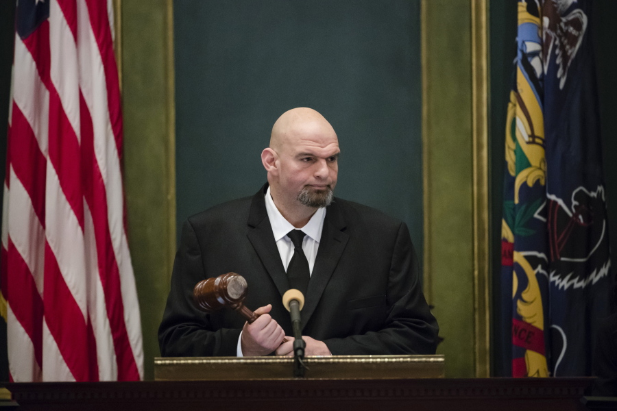 FILE - Pennsylvania Lt. Gov. John Fetterman John Fetterman holds a gavel after he was sworn into office on Jan. 15, 2019, at the state Capitol in Harrisburg, Pa. In 2019, Fetterman's first year in office, he regularly attended ribbon cuttings and conducted a statewide listening tour focused on legalizing marijuana.