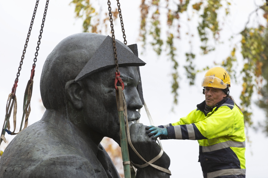 A statue of Vladimir Lenin is removed from the streets of the city of Kotka, Finland Tuesday, Oct. 4, 2022. The southeastern Finnish city of Kotka on Tuesday removed the last publicly displayed statue of Russian bolshevik leader Vladimir Lenin in the Nordic country due to increasing pressure from residents in the wake of Russia's war in Ukraine.