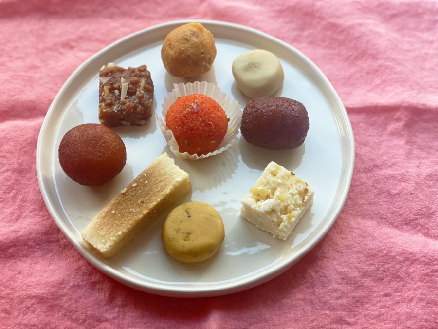 An assortment of sweets from an Indian food shop. These sweets are typically enjoyed on Diwali, the Hindu festival of lights.