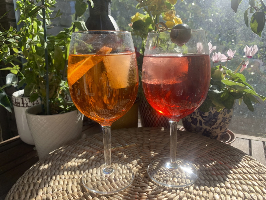 This wine-based cocktail in its modern form consists of prosecco, digestive bitters and soda water. The prosecco adds fizz to a drink that had traditionally been made with nonsparkling white wine. Bitters like Select, Aperol and Campari make the drink glow bright red and orange. Pictured here is an Aperol Spritz, left, and Select Spritz.