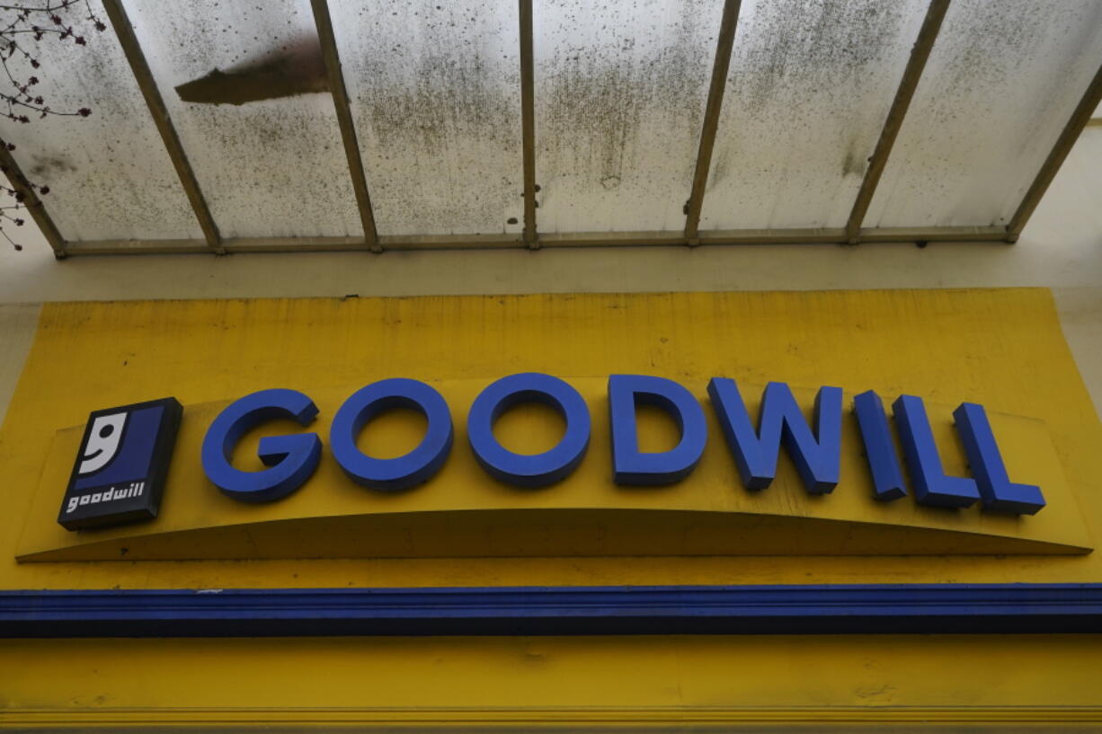 FILE - A Goodwill store sign is shown in Berkeley, Calif., Tuesday, March 9, 2021. Goodwill Industries International Inc., the 120 year-old non-profit organization that operates 3,300 stores in the U.S., and Canada,  has launched an online business, as part of a newly incorporated recommerce venture called GoodwillFinds.