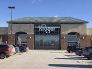 FILE - Exterior of the Kroger grocery store in Novi, Mich., is seen Saturday, Jan. 23, 2021.  Two of the nation's largest grocers are planning to merge. Kroger said Friday, Oct. 14, 2022, it has agreed to acquire Albertsons in a $20 billion deal.