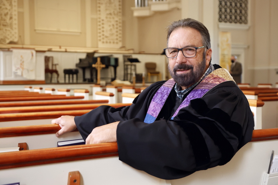 Pastor Mike Usey sits Sept. 25 in the pews of College Park Baptist Church in Greensboro, N.C.